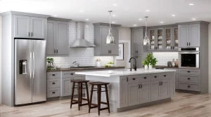 If you’ve been shopping for kitchen cabinets or checking out specifics for an upcoming kitchen remodel, you’ve no doubt come across the term “Shaker cabinets”. Maybe you’re already familiar with this style, but perhaps it’s something new to you. Nonetheless, it’s important for you to know a little something about this simple style of cabinetry before you make your final decisions about your kitchen renovation. What does “Shaker” mean? If you’re not a history buff or familiar with religious groups of early America, you may not know that the Shakers were a Christian sect that came to the U.S. from England in the 18th century. The Shakers – also sometimes known as the Shaking Quakers due to their gyrations during worship – were a simple people that lived a very simple life. Everything in their world was quite minimalistic, including their architecture and the style of the furniture they used. In homage to the Shakers, a style of simple kitchen cabinets bear their name. The classic design of these cabinets have long made them popular for those who seek something not too ornate, and they continue to be trendy into the 21st century. Why choose Shaker cabinets? Shaker cabinets, particularly white Shaker cabinets, are visually simplistic. That offers a lot of reasons why many homeowners choose them when designing a new kitchen or remodeling their old one. • The durable, all-wood construction of a Shaker cabinet includes rail frame and panel construction with recessed panel doors. This means lines are clean and classic. Should you choose white Shaker kitchen cabinets, for example, your space will look super pristine and bright without a lot of unnecessary embellishments. Hinges are generally hidden as well. • You’ll love the versatility of white Shaker cabinets or any other color designed in this style. Literally, Shaker cabinets are available in dozens of different paint colors and stains, so you can select something that compliments the rest of your home while still maintaining a simple blueprint. You can also make these cabinets your own by selecting unique hardware that fits your vibe or that of the rest of your kitchen. • Because Shaker cabinets are plain, the price of these cabinets tends to be less than most other styles. That’s ideal for the homeowner who’s on a budget yet needs or wants to remodel their kitchen. Truly, you can get a room full of white Shaker cabinets for a much lower cost than you’d pay for just a handful of ornate cherry wood cabinets, for example. What color should I choose? You may already have a color palette in mind for your kitchen cabinets, but if you’re still thinking about which direction to go, here are a few ideas. • Gray – Gray Shaker cabinets have become quite popular in homes where the homeowner seeks a more contemporary look. If you want a neutral kitchen but don’t want white, light gray – in particular – is a great alternative. Pair them with white countertops and a white subway tile backsplash and perhaps even a white floor. The gray breaks up the monotony of having all one color. • White – White Shaker kitchen cabinets remain as popular as ever and are amongst the top cabinets sold in the U.S. each year. They give you that clean, pristine look but can be quite modern as well if paired with the right elements and accessories. For example, if you pair them with gold hardware and lighting, you’ll have a very chic look. Combine them with brushed nickel hardware and fixtures and you’ll get a more country vibe. With white Shaker kitchen cabinets, the possibilities are endless. • Other colors – The beauty of the simplicity of Shaker cabinets is that they look good in just about any color. Kitchens in coastal homes, for example, often choose a shade of blue for their Shaker cabinets. If you prefer stained cabinets, that’s fine, too. You’ll find this style in a variety of stains, including light, medium, and dark. Again, you can pair these hues with just about anything, thanks to the simplicity of the cabinets. Intrigued by Shaker cabinets and their versatility? At Mr Cabinet Care, we think white Shaker cabinets and all the other colors as well are an ideal choice for many kitchens. If you seek simplicity, clean lines, and more, all at an affordable price, talk to us about our vast line of Shaker cabinets. For more information, visit us at www.mrcabinetcare.com. Meta description: Discover how the simple, clean lines of Shaker cabinets pair with a variety of styles and décor for a pristine kitchen remodel Meta tag: Shaker kitchen cabinets help keep your remodel stylish and affordable.